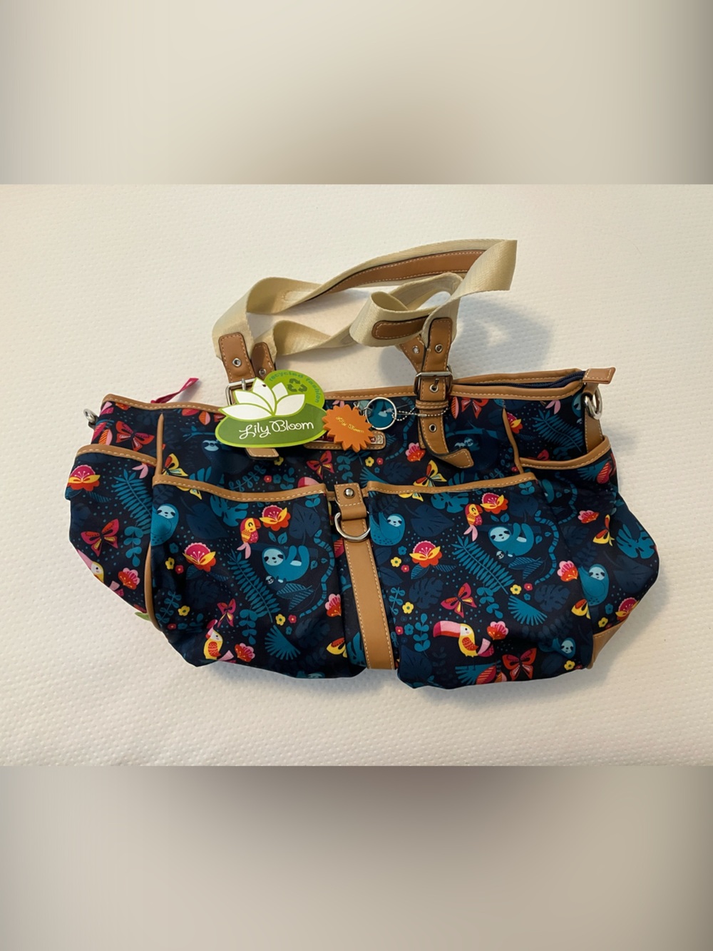 Lily Bloom Navy Blue Floral Baby Bag with Tan Accents